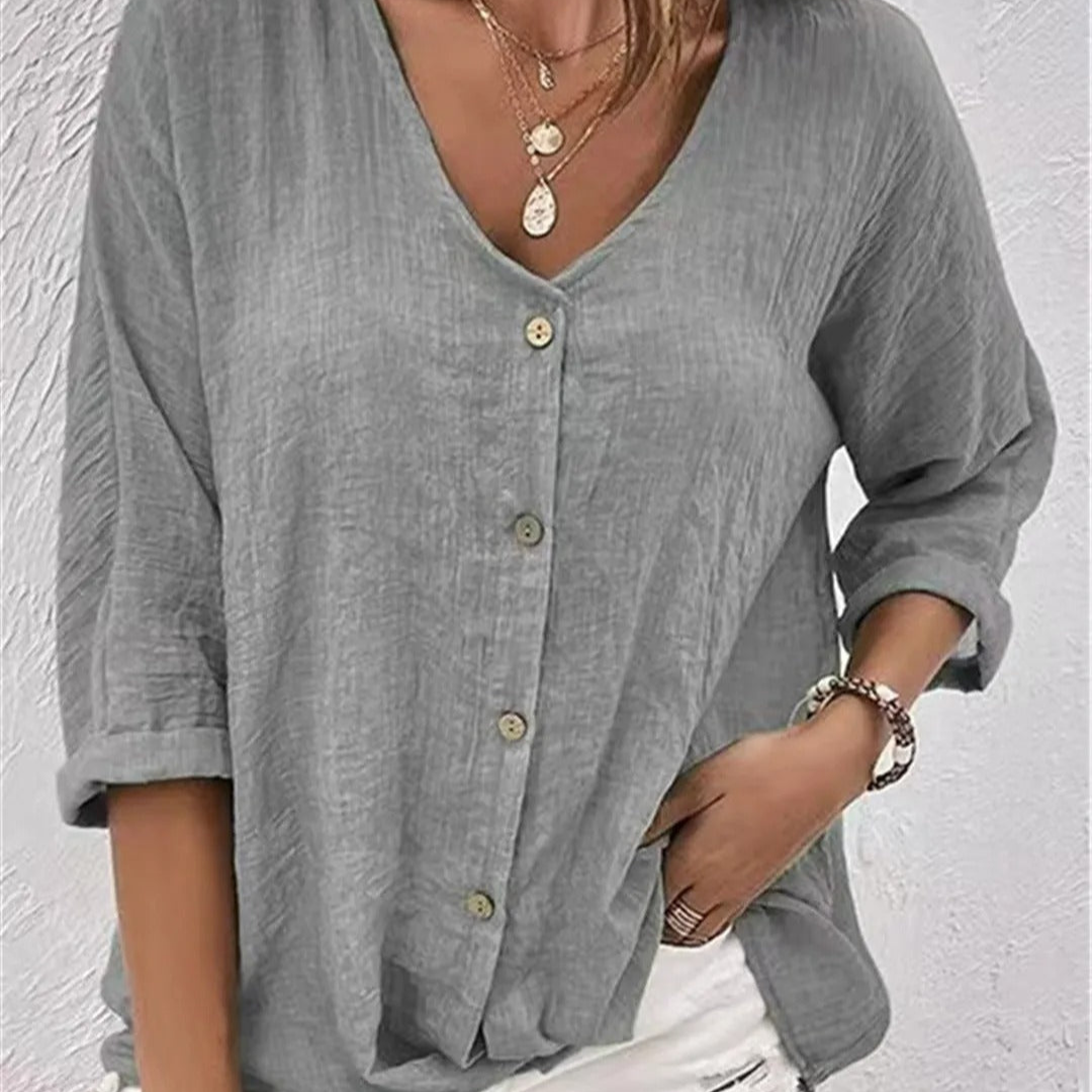 Blusa femenina casual con cuello en V abotonado y mangas remangadas