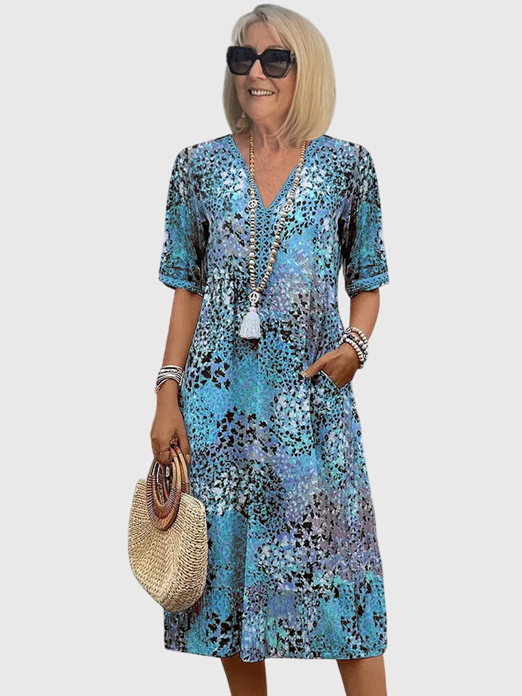 Bella | Robe midi élégante à fleurs