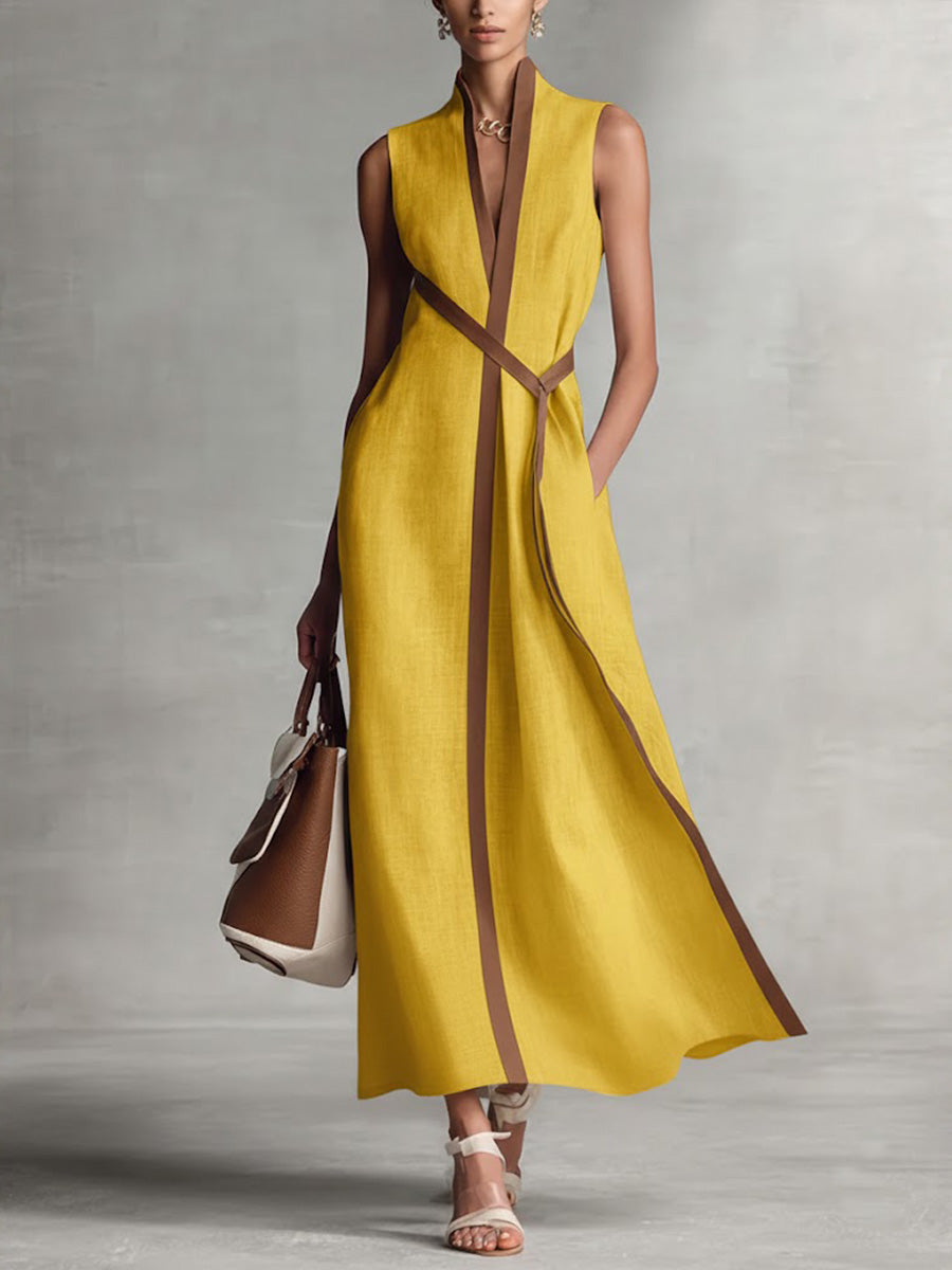 Vestido largo de mujer con corte fluido y detalles en contraste