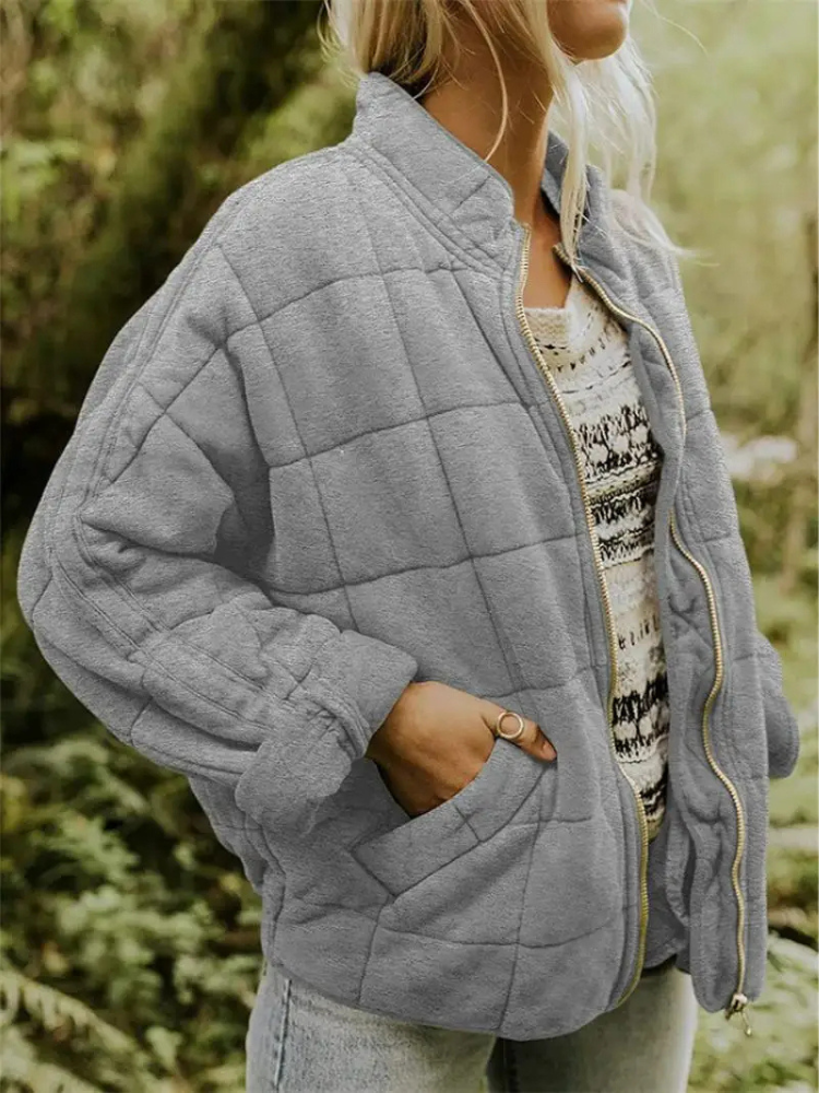 Women's quilted zip-up jacket with pockets