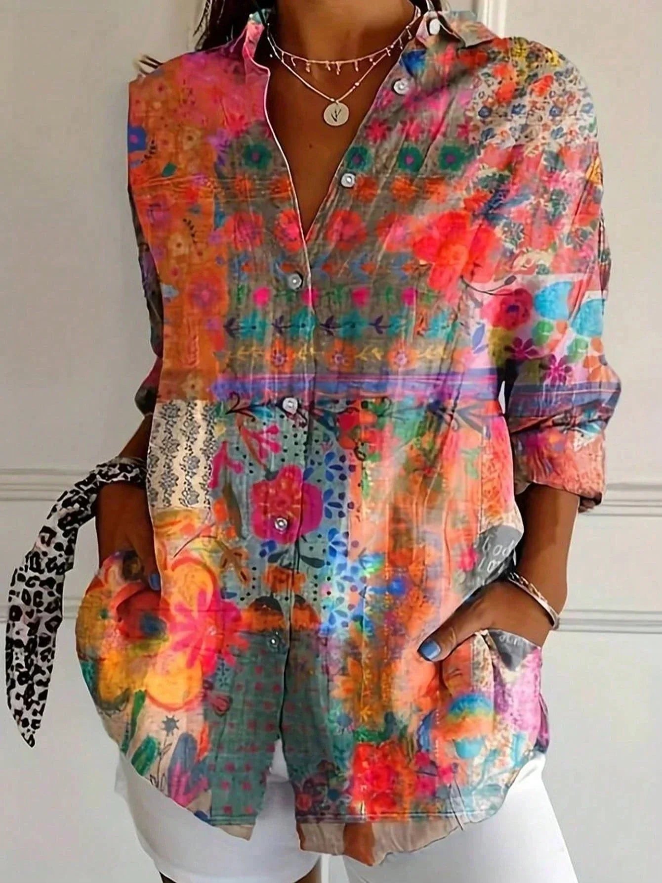 Women's blouse with abstract print and buttons
