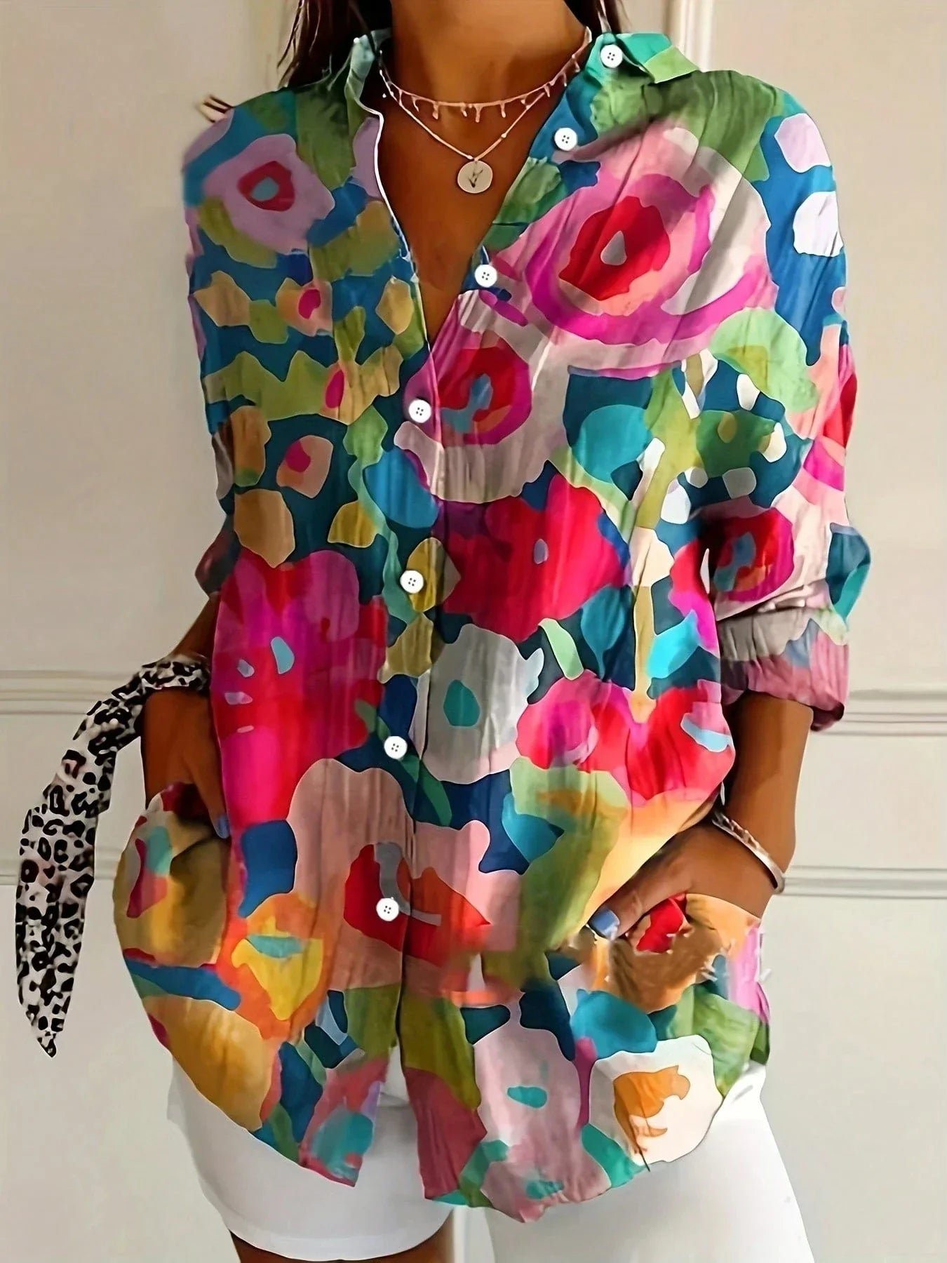 Women's blouse with abstract print and buttons