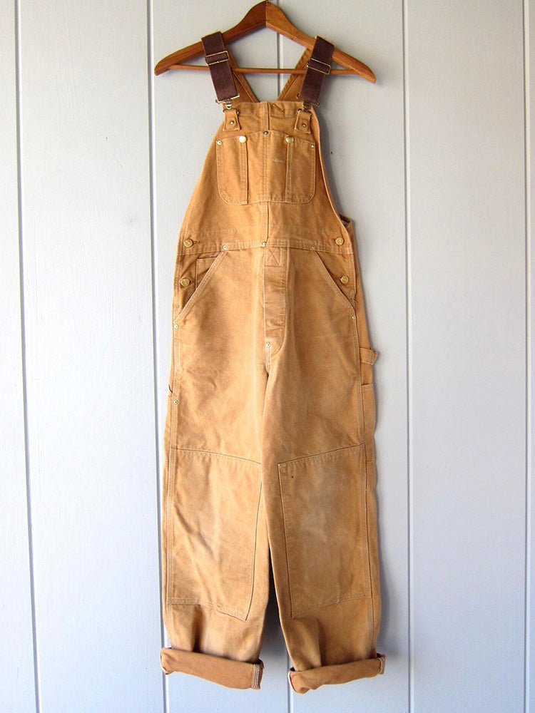 Women’s utility jumpsuit with shoulder straps and a relaxed fit