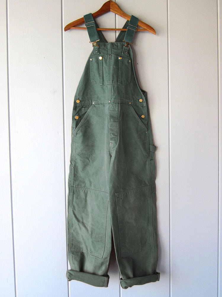 Women’s utility jumpsuit with shoulder straps and a relaxed fit