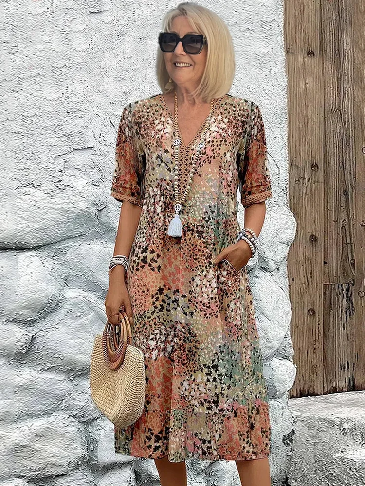 Robe midi fluide à col en V et imprimé floral pour femme