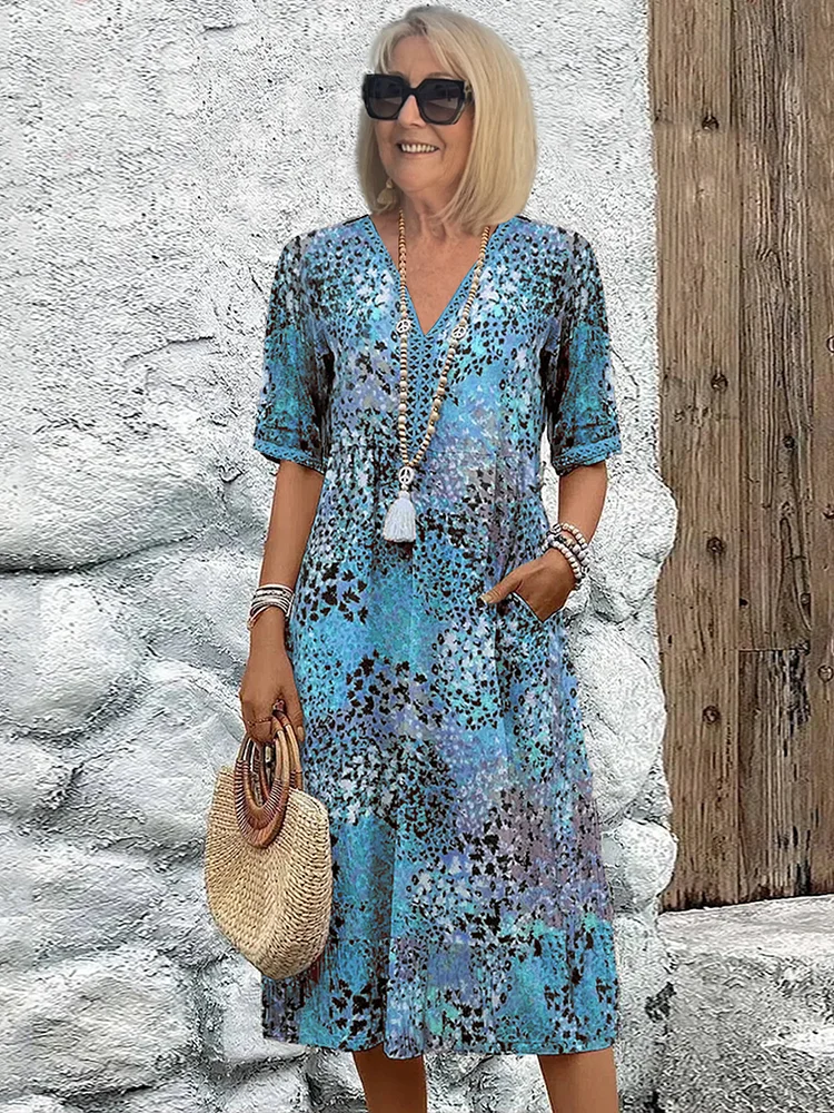 Robe midi fluide à col en V et imprimé floral pour femme